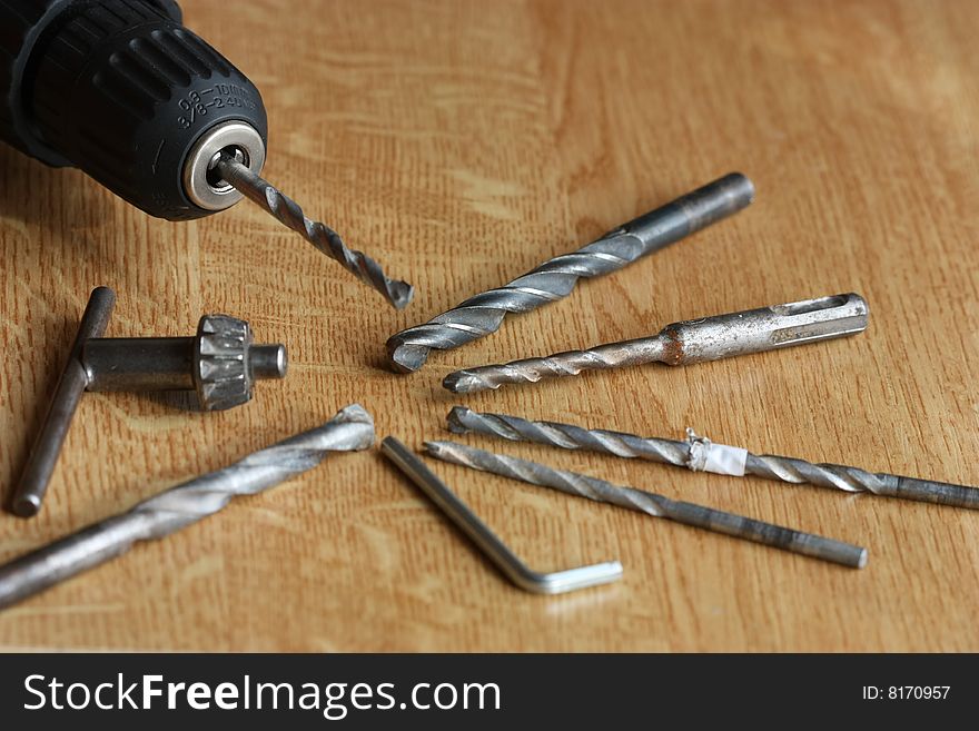 Hand drill equipment on the desk. Hand drill equipment on the desk