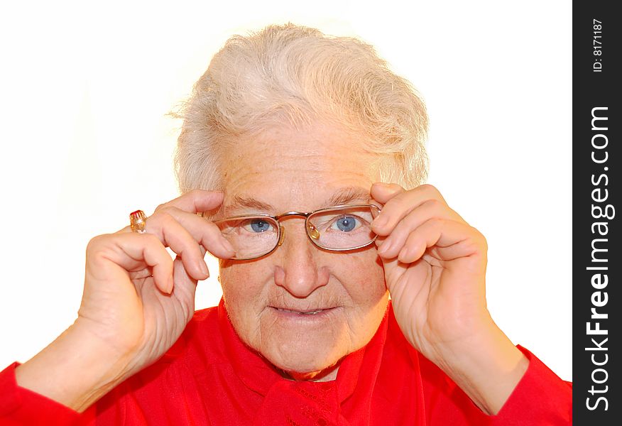 A portrait of elderly woman is in red