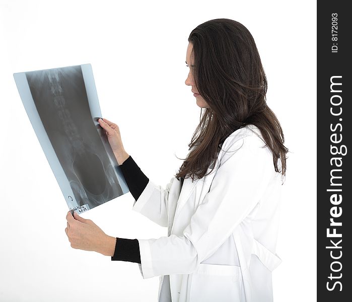 Female doctor checking x ray image