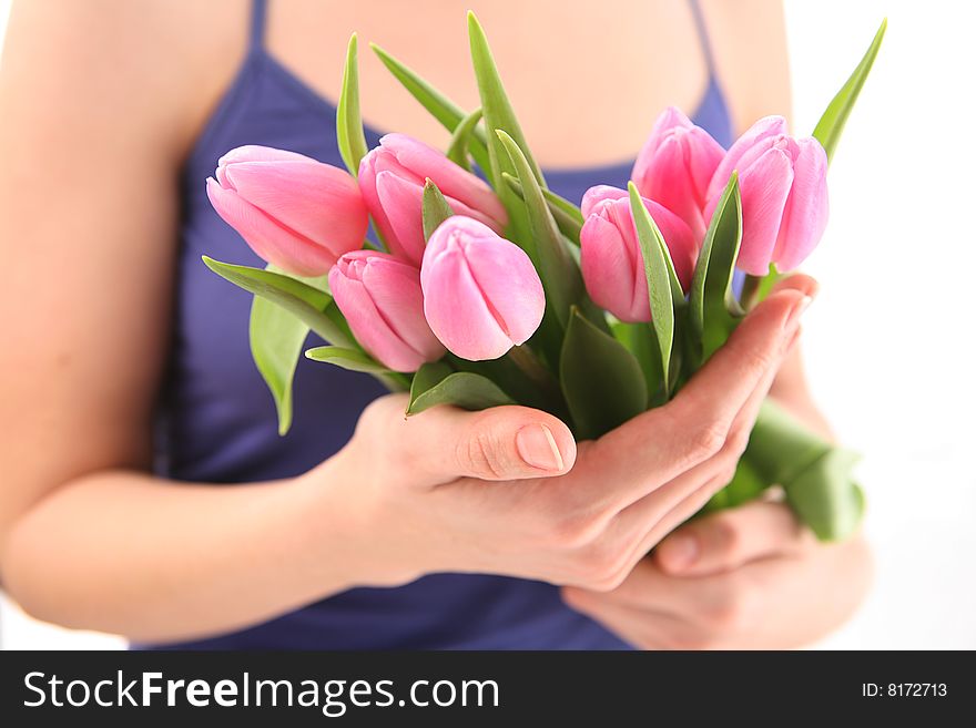 Beautiful hands holding tulips. Soft-focused. Beautiful hands holding tulips. Soft-focused.