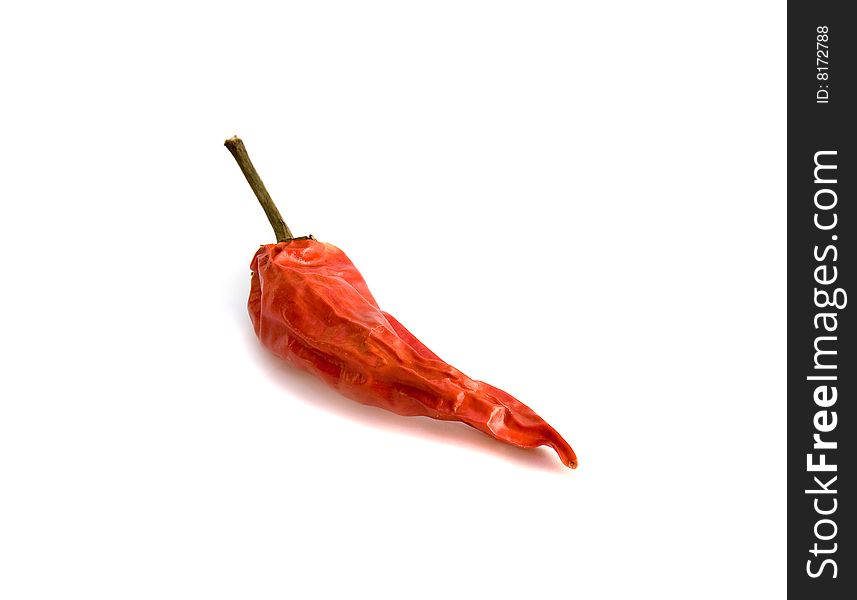 Red hot pepper close up, isolated over the white background