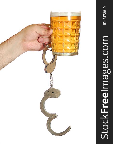Male hand unchained  from o a mug of beer. Male hand unchained  from o a mug of beer