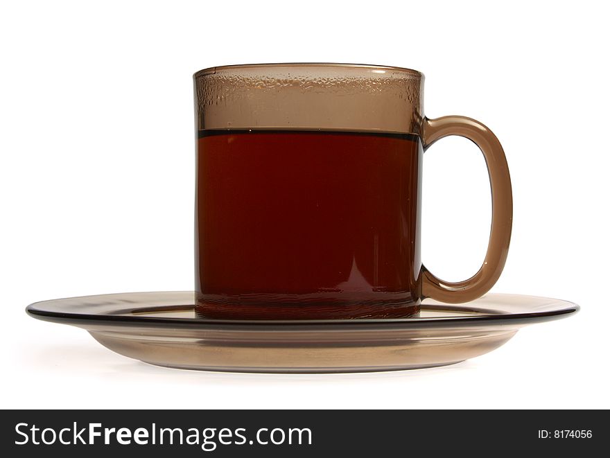 Glass cup of tea isolated on white