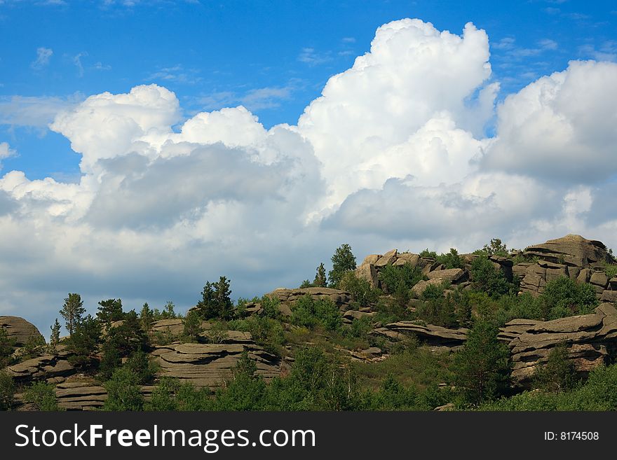 Altay mountain landscape. Mountain, sky and clouds. Altay mountain landscape. Mountain, sky and clouds.