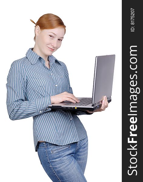 Young business woman with the laptop isolated on a white background