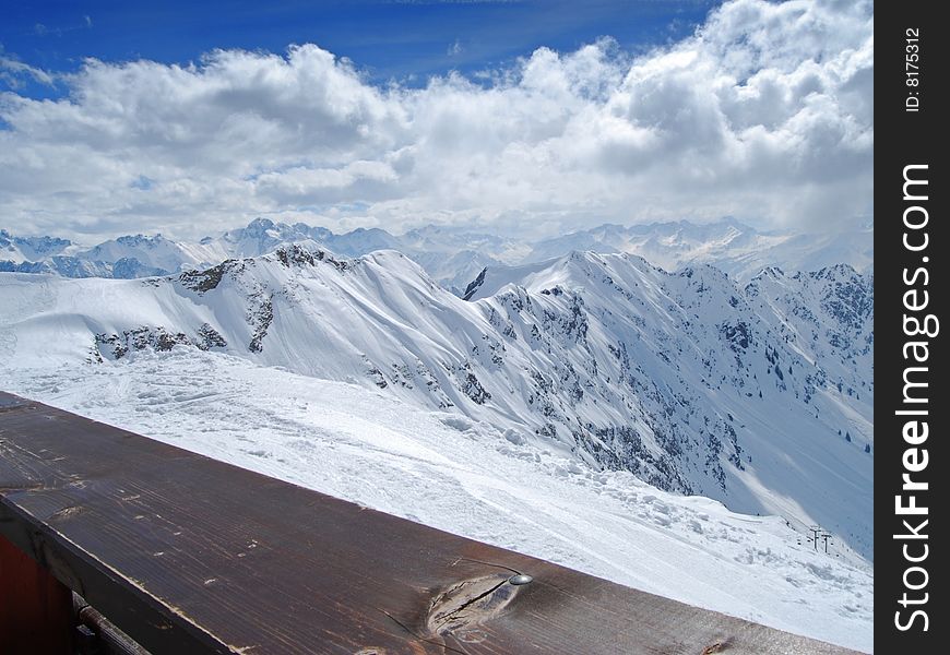 Sunny winter day in the European Alps. Picture was taken from Nebelhorn near Oberstdorf in Bavaria, Germany. Sunny winter day in the European Alps. Picture was taken from Nebelhorn near Oberstdorf in Bavaria, Germany.