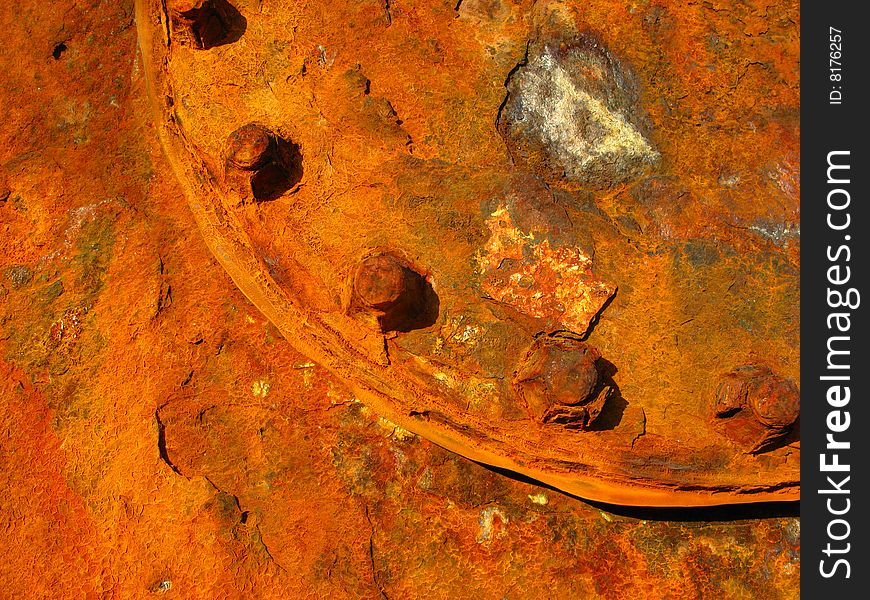 Surface of rusty metal of orange color covered by the sun. Surface of rusty metal of orange color covered by the sun