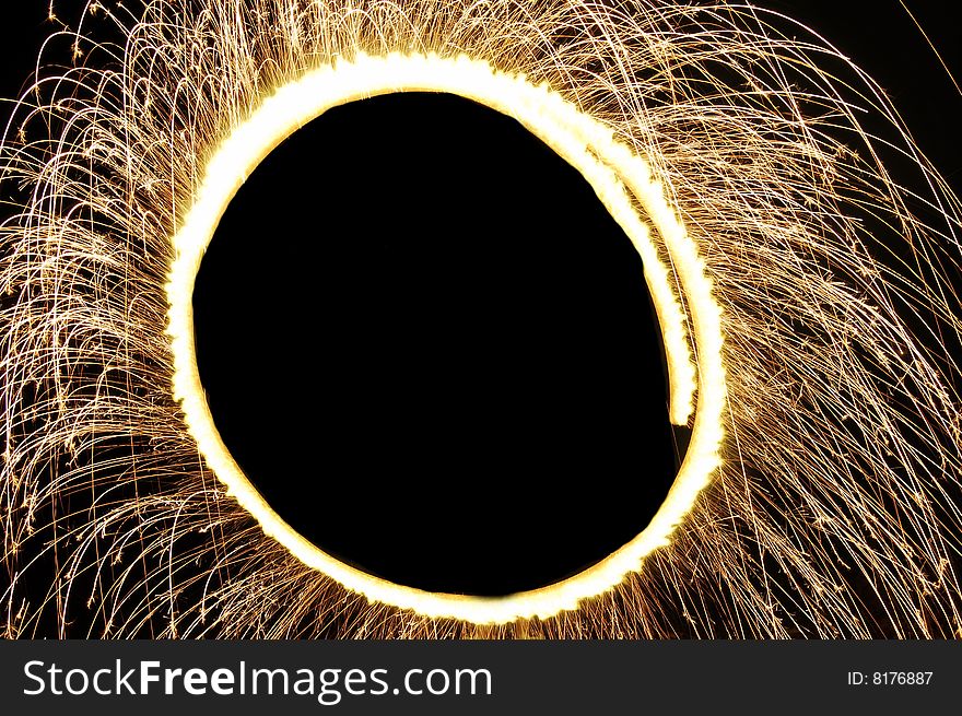 A glowing ring of sparks. A glowing ring of sparks.