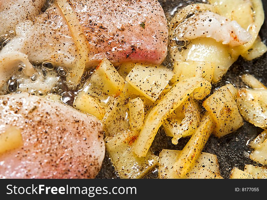 Pangasius filet frying with yellow peppers. Pangasius filet frying with yellow peppers