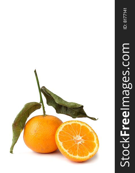 Ripe juicy tangerines on a white background