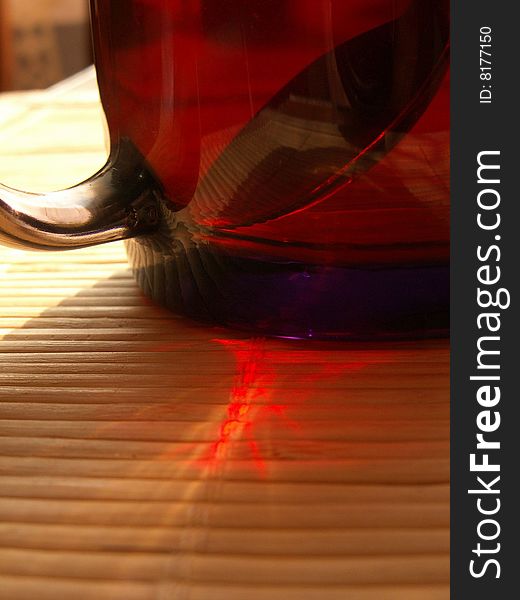 Hot black tea in a transparent glass cup