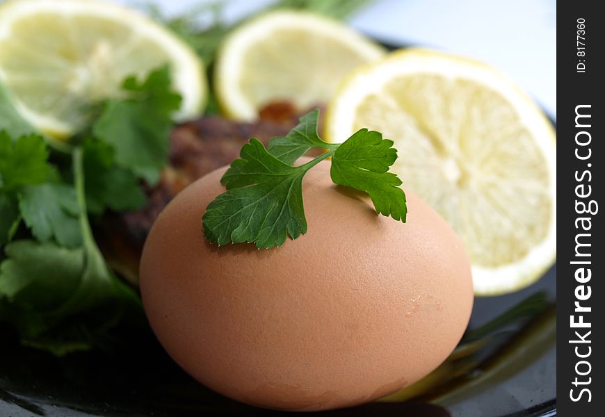 Egg, lemon, parsley on morning meal