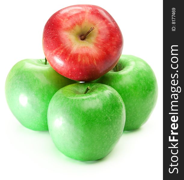Three green and one red apple, isolated. Three green and one red apple, isolated