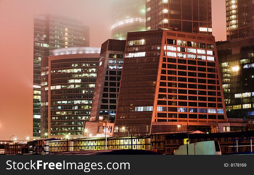 Scyscrapers In Mist At Night