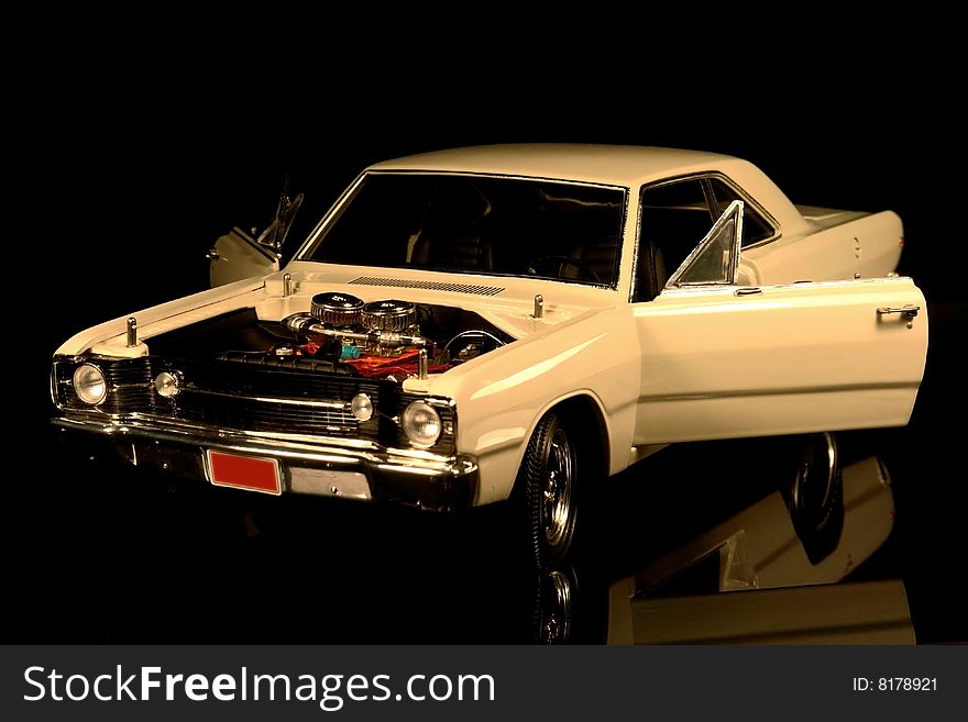 Cream colored Dodge Dart collector model. Cream colored Dodge Dart collector model