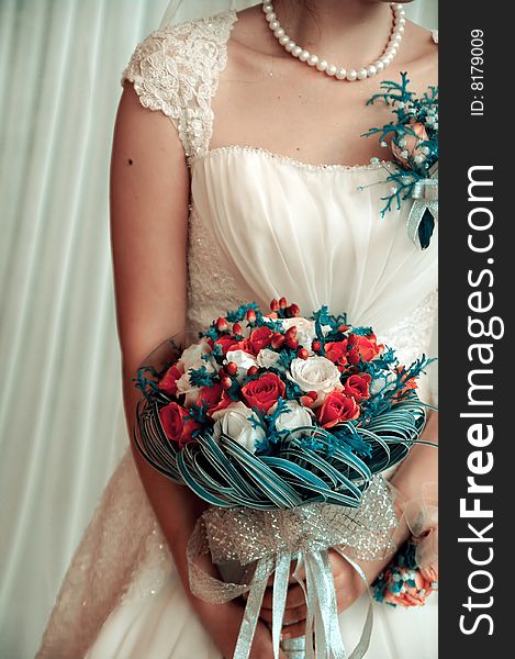 Bride with flower in her hand