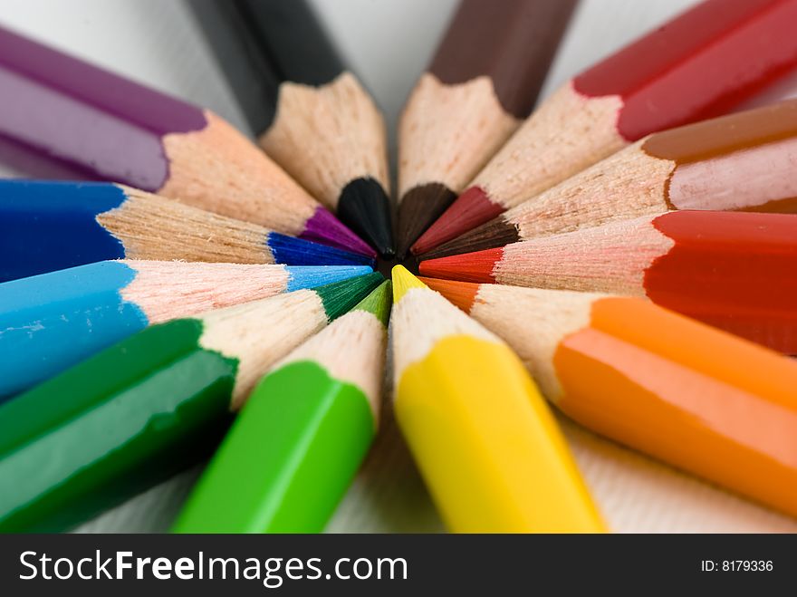 Colored pencils forming a circular shape