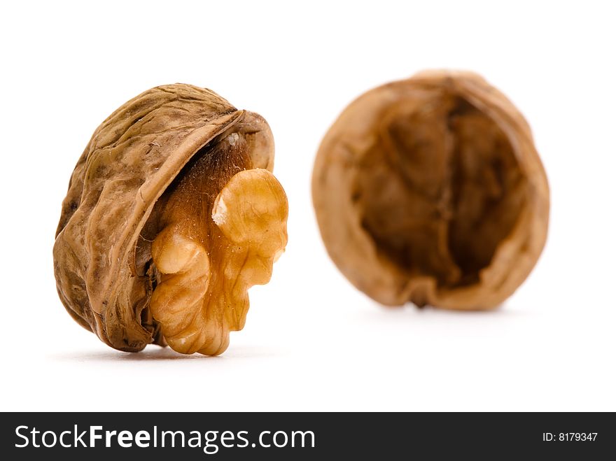 Broken walnut on white background