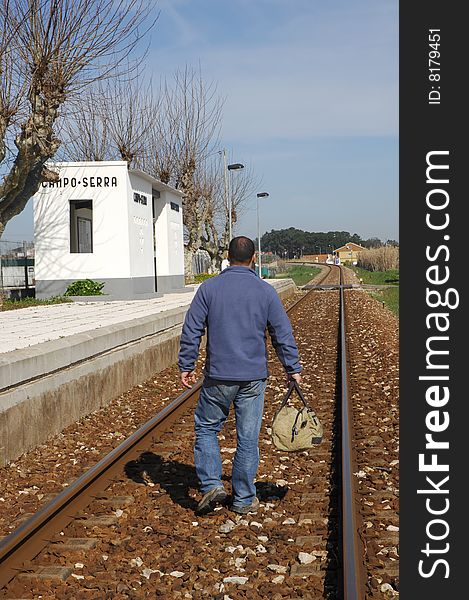 Man walking on a railway. Man walking on a railway