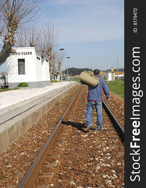 Man walking on a railway. Man walking on a railway