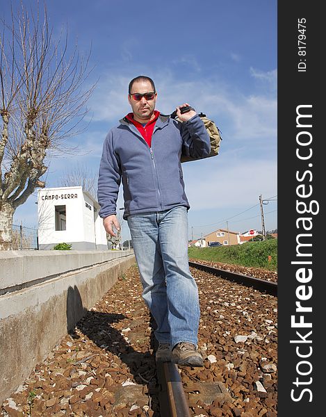 Man walking on a railway. Man walking on a railway