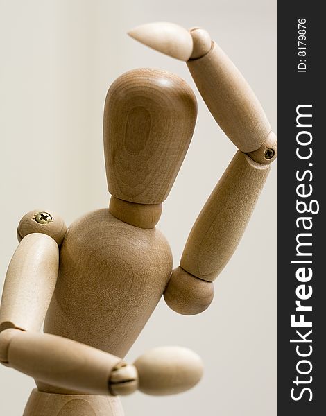 Close up of a wooden figure posing. Close up of a wooden figure posing