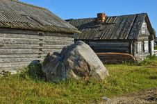 Old Wooden Shed And Big Stone Royalty Free Stock Photography Old Wooden Shed And Big Stone Royalty Free Stock Photography