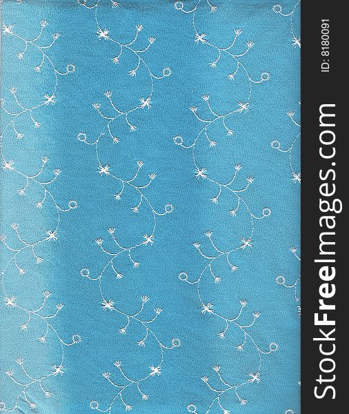 Textile with nuances of blue, embroidered. Textile with nuances of blue, embroidered.
