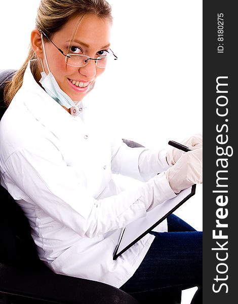 Front view of female doctor against white background. Front view of female doctor against white background