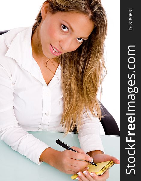 Portrait of young professional looking at camera with white background