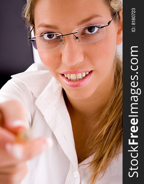 Top view of smiling employee looking at camera  in an office