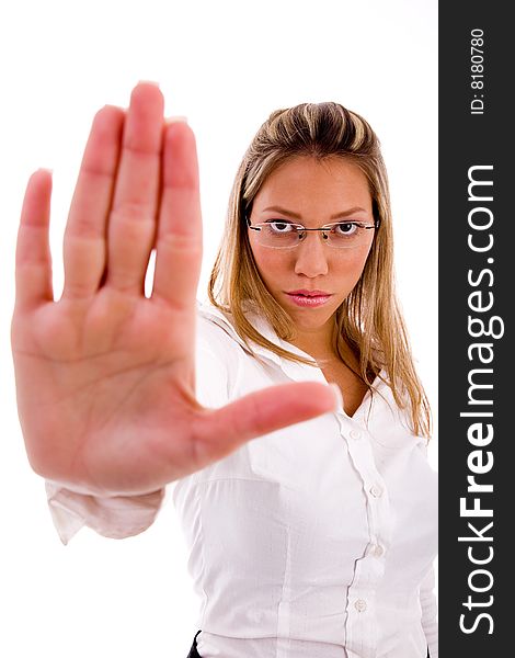 Front view of businesswoman showing stopping gesture on an isolated background
