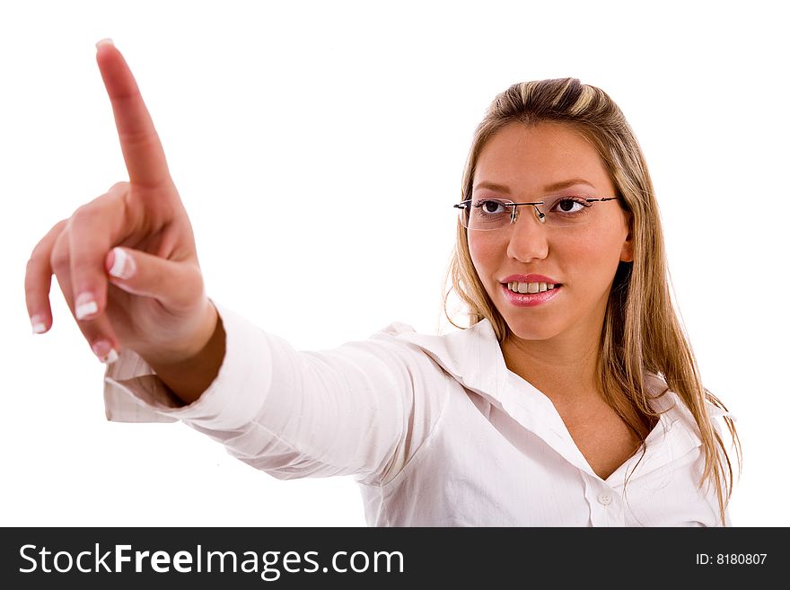 Portrait of businesswoman pointing up with white background