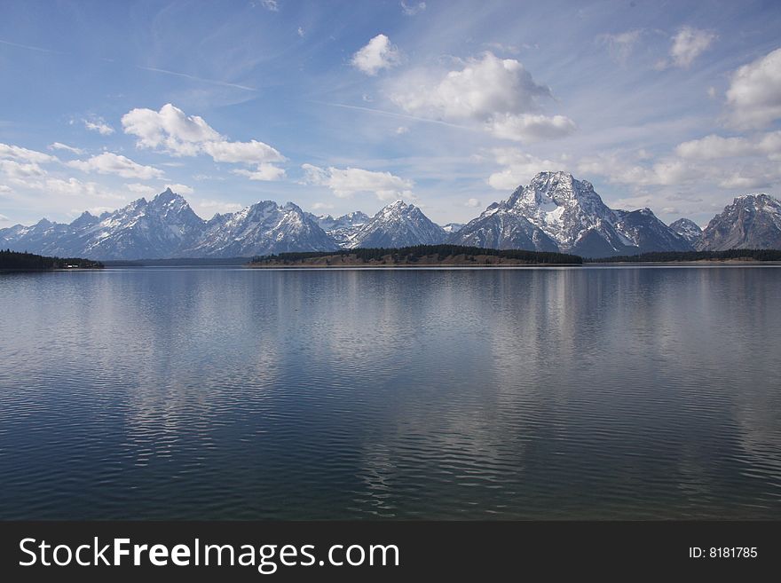 A view of the Tetons across Jackson Lake from near the Jackson Lake Dam. A view of the Tetons across Jackson Lake from near the Jackson Lake Dam