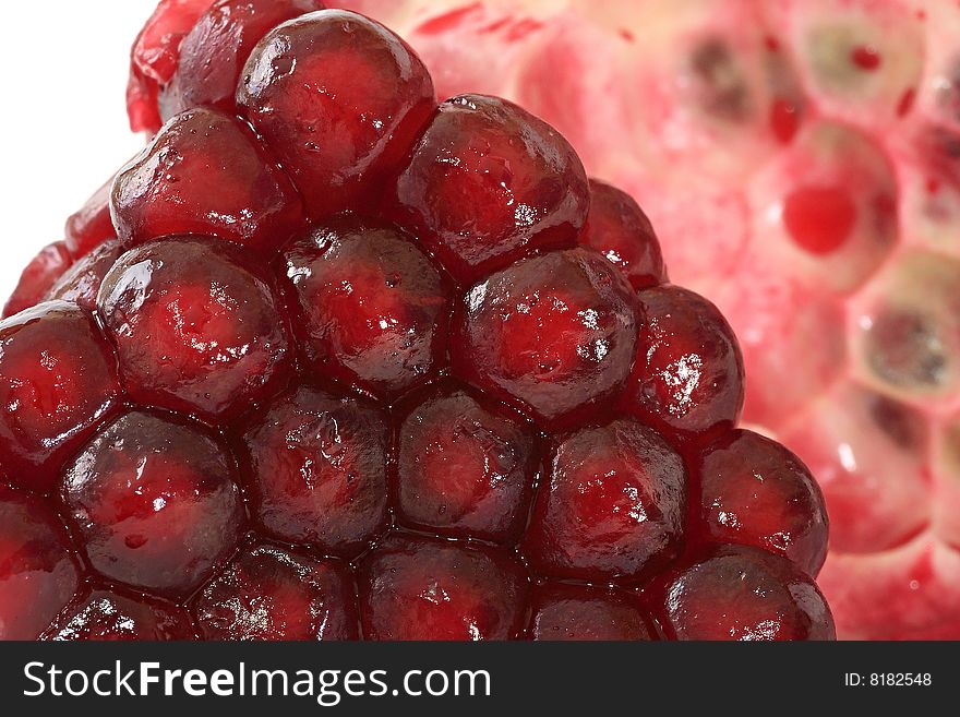 Grains of ripe pomegranate. Fruit.