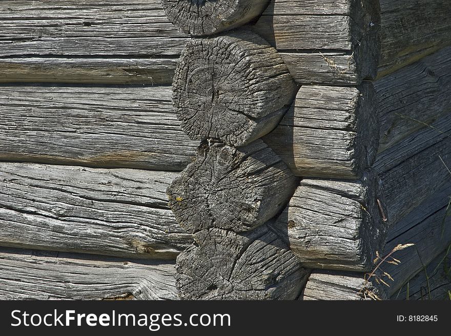 Fragment of old wooden country house wall. Fragment of old wooden country house wall