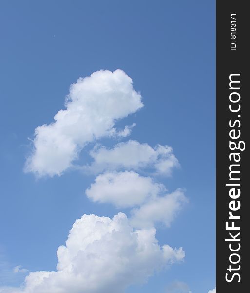 Snow Summer White Cumulus Clouds on deep blue sky. Snow Summer White Cumulus Clouds on deep blue sky