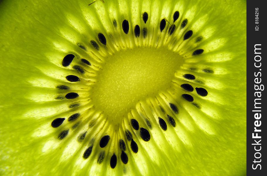 Bright green close up of a kiwi fruit. Bright green close up of a kiwi fruit.