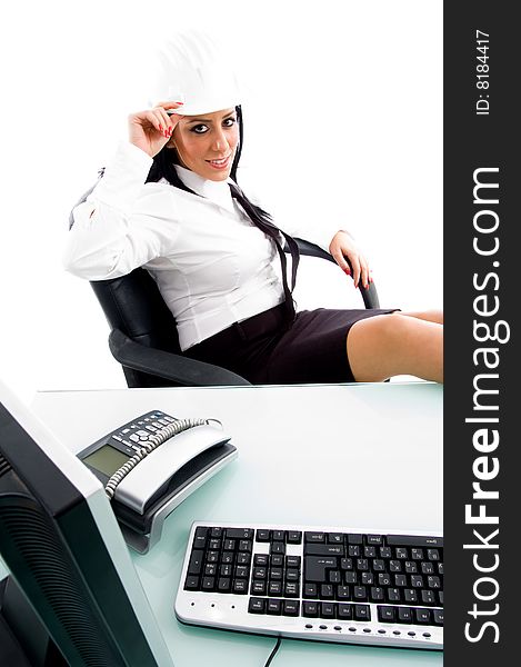 Architect sitting in office against white background