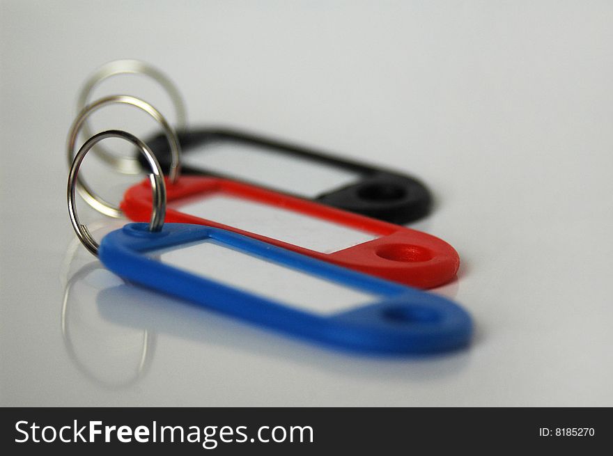 Red, blue, black, blank key tags isolated