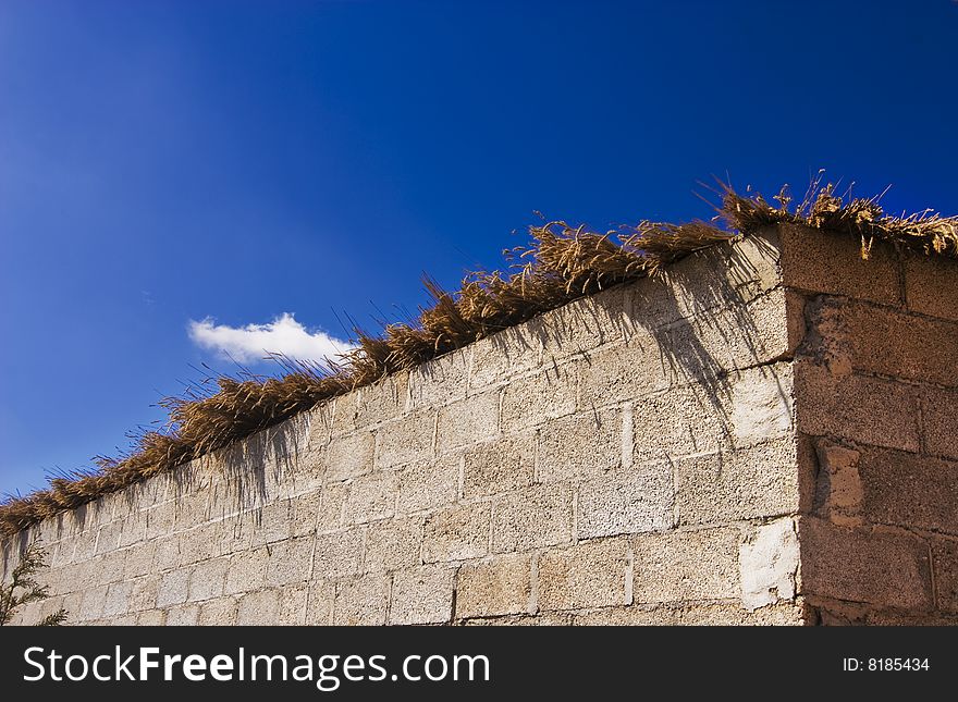 One noodles brick wall, the sky in blue