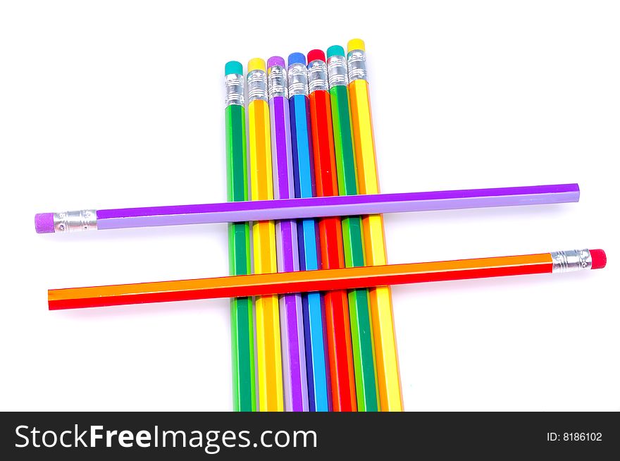 Colored pencils isolated on white.
