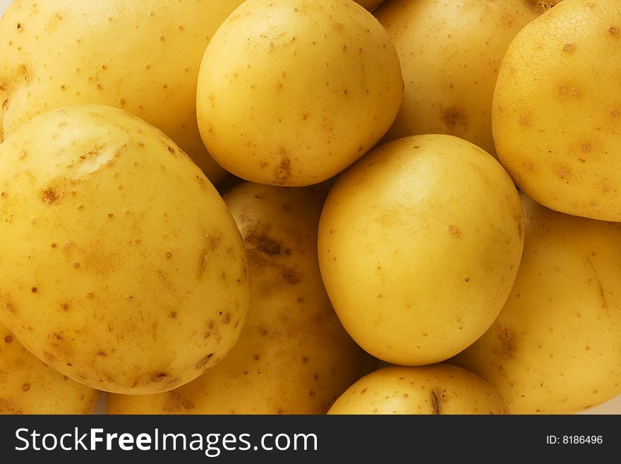 Close up shot of freshly washed potatoes. Close up shot of freshly washed potatoes