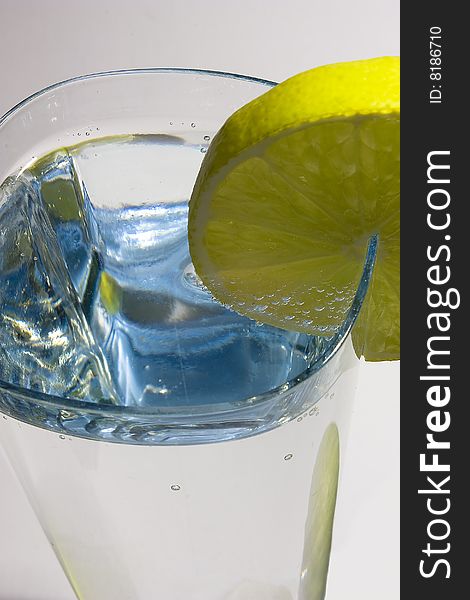 Glass of water with lemon or limes