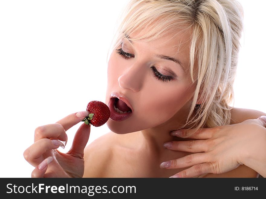 Lovely blondie girl with strawberry isolated on white