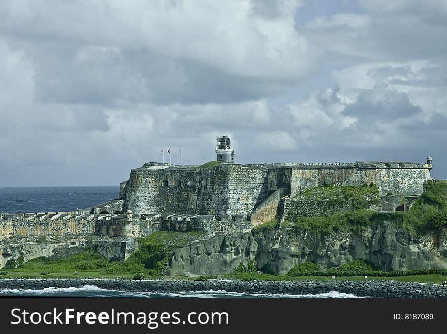 An old fort standing over the coast of an island. An old fort standing over the coast of an island