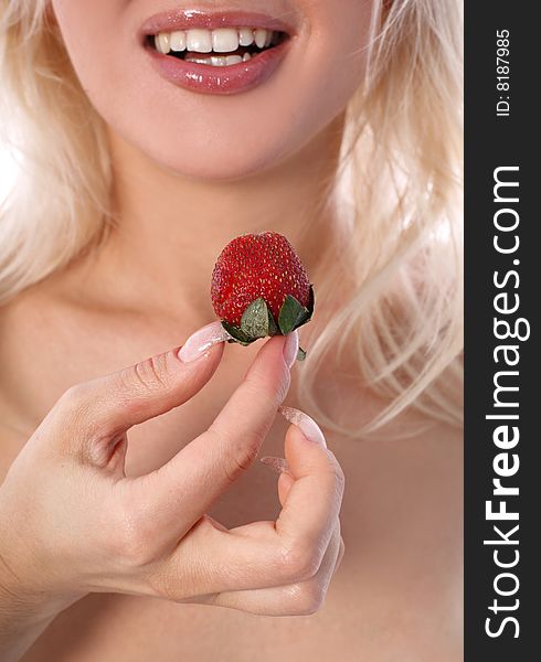 Blondie girl with strawberry isolated on white