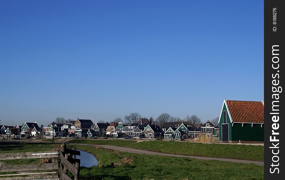 Traditional old Dutch scenery, a chain of little houses alongside the river. Traditional old Dutch scenery, a chain of little houses alongside the river.