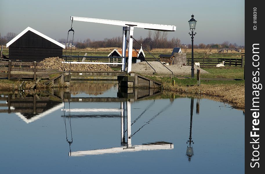 Old bridge, typical  Dutch scenery , Zaanse houses