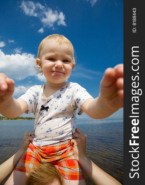 Happy child and blue sky. Happy child and blue sky